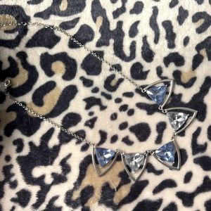 Short silver necklace with blue and clear stones